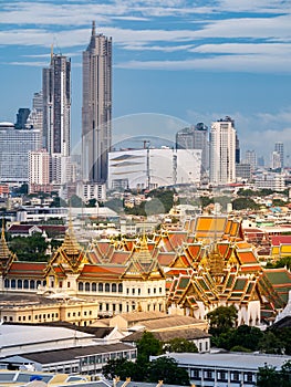 Grandpalace and temple with high sky building background