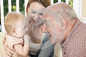 Grandparent With Daughter And Granddaughter