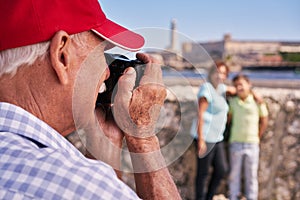 Grandparents With Boy Family Holidays Grandpa Taking Photo