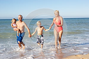 Grandparents With Grandchildren On Holiday