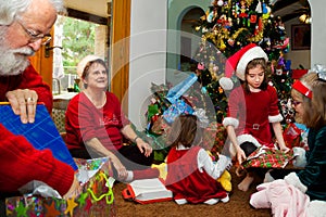 Grandparents and Grandkids Unwrap Christmas Presents
