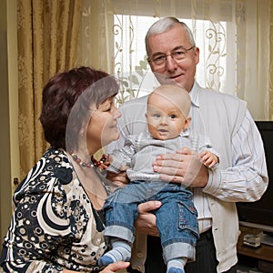 Grandparents with grandson photo