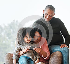 Grandparents, happy family and relax child with phone for subscription movie, online games or home streaming app. Kid