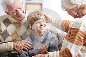 Grandparents taking care of grandson