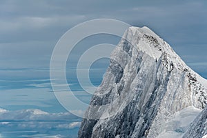 Grands Jorasses mountain summit covered by snow ice in winter