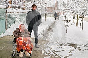 The grandson and the grandmother on walk.