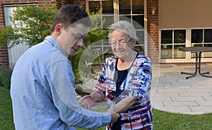 Grandson helps his great-grandma to go