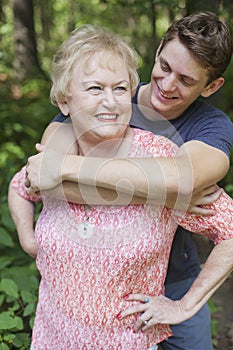 Grandson hugging grandmother