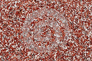 Granite background. Natural stone texture. Red surface. Pattern