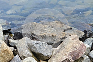 Granite Boulders Along The Lake Shoreline