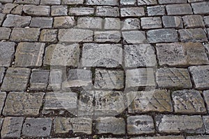 Granite cobblestoned pavement background. photo