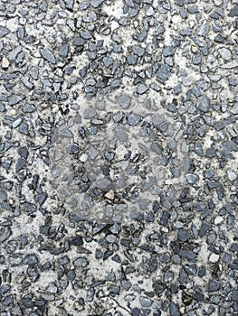 Granite floor texture background. Floor surface with pebbles.