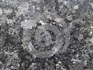 Granite granitoids rough honed surface finished wall, floor material black and gray color background, Always has a tight texture,