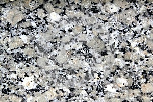 Granite gray white black stone texture closeup