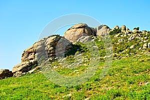 The granite megalith on the hillside