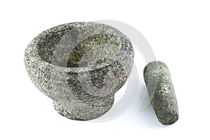 Granite pestle and mortar isolated on a white background