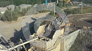 Granite quarry. Extraction of granite. Open cast mine. Stone Quarrying - Aerial view