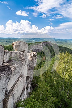 Granite rock ridge Shihan. Arakul lake. South Ural