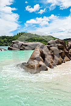 Granite rocks on Baie Lazare Public Beach, Mahe Island, Seychelles.