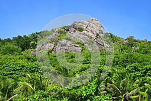 Granite rocks close to Anse Pierrot beach. La Digue Island, Seychelles.