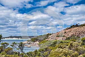 Granite rocks, coastal vegetation and dunes at Lucky Bay, Western Australia.