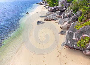 Granite rocks and sand in Anse Citron beach