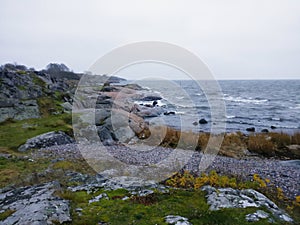 Granite rocks at sea shore at the evening