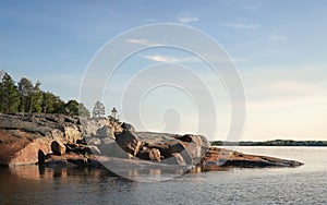 Granite rocks with woods of coastline and islands in North Europe, Baltic sea, gulf of Finland. Clean nordic nature