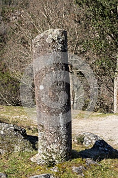 Granite roman milestone in Via XVIII, Roman road between Braga and Astorga. Baixa Limia-Serra do Xures Natural Park Galicia, Spain photo