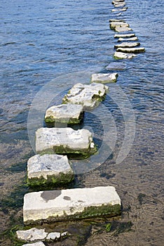 Granite stepping stones cross a river