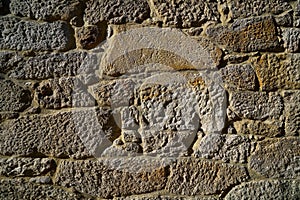 Granite stone bush hammered masonry wall