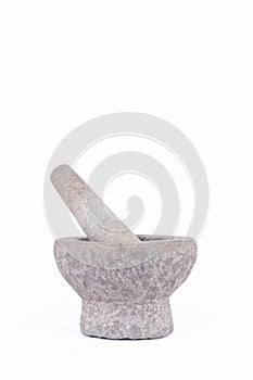 Granite stone mortar and pestle are Thai cooking tool on white background food isolated