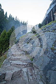 Granite stone steps leading up to Vernal Falls on the Mist hiking trail in Yosemite National Park in California USA