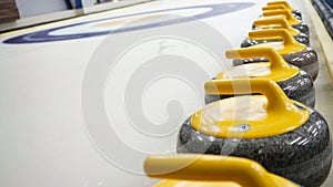 Granite stones for curling on white ice close-up.Winter sport, team game.Curling Club