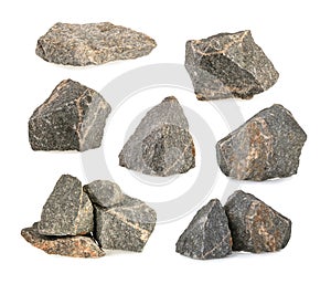 Granite stones, rocks set isolated on white background photo