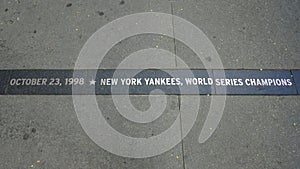 Granite strip commemorates the New York Yankees` 27th World Series championship ticker-tape parade held along the Canyon of Heroes