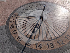 Granite sundial in Sevastopol shows 15 hours. Summer sunny da