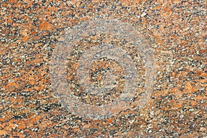 The granite surface is red, as a background. Natural stone.