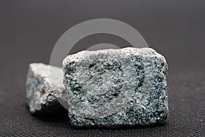 Granites are coarsely crystalline plutonic rocks plutonites rich in quartz and feldspar