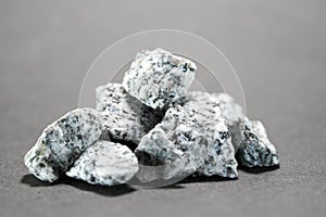 Granites are coarsely crystalline plutonic rocks plutonites rich in quartz and feldspar