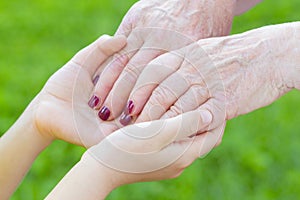 Granmother and niece holding hands