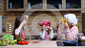 Granny with children at home kitchen