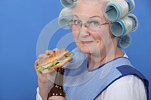 Granny eating a burger