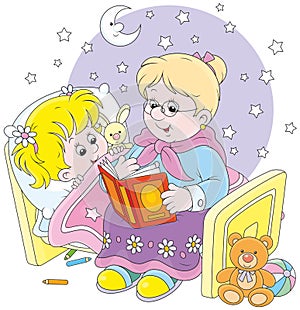 Granny and granddaughter reading fairytales photo