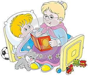 Granny and grandson reading fairytales photo