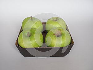 Granny Smith apple fruit food in cardboard basket