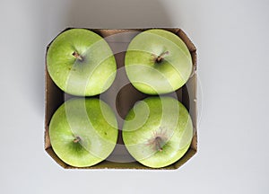 Granny Smith apple fruit food in cardboard basket