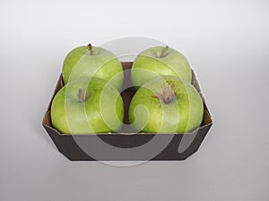 Granny Smith apple fruit food in cardboard basket