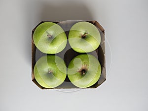 Granny Smith apple fruit food in cardboard basket