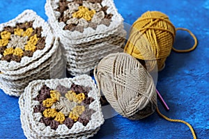 Granny sqare pattern made of natural wool yarn